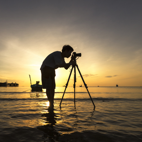 Entry level photographers travel back-pack